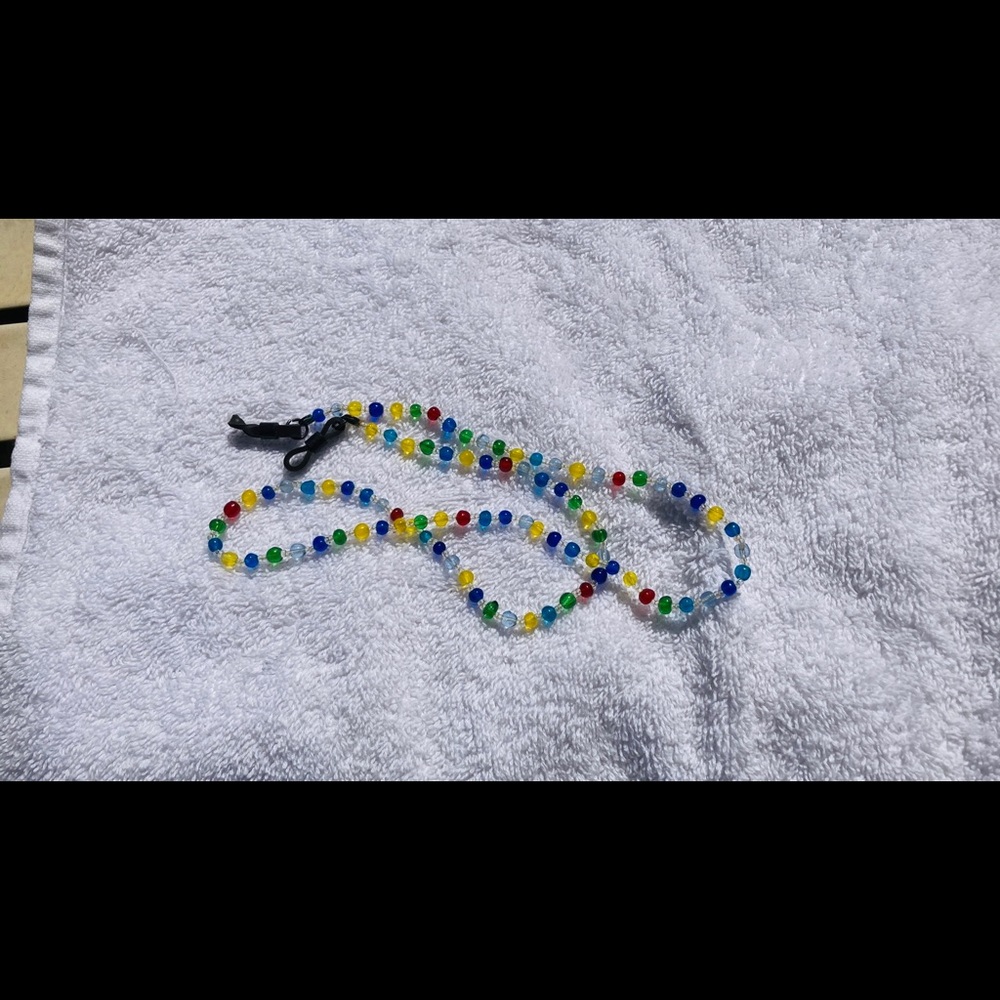 Beaded eyeglass chain holder